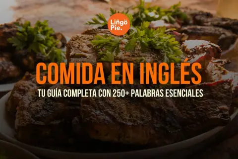 Platos de carne asada y pollo adornados con perejil. El texto dice "Comida en inglés: Tu guía completa con 250+ palabras esenciales".