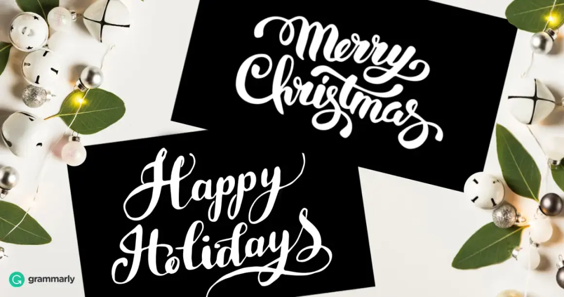 Tarjetas negras con letras blancas: "Merry Christmas" y "Happy Holidays". Aprende cómo se dice feliz navidad en inglés.