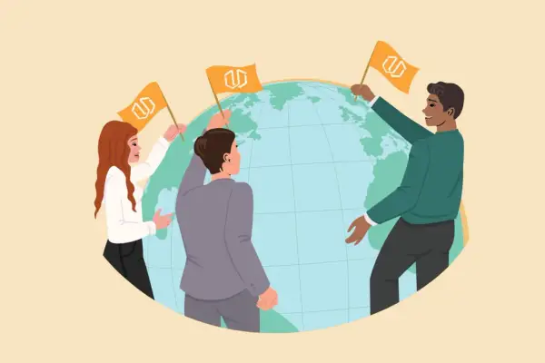 Personas de diversas nacionalidades en inglés, alrededor del mundo, sostienen banderas con un logo.